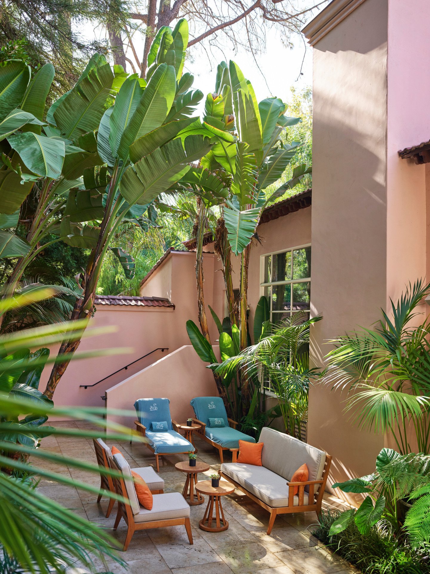 Back patio of presidential suite with lounge chairs