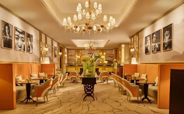 Il Salotto lobby lounge with black and white photographs hanging on the walls