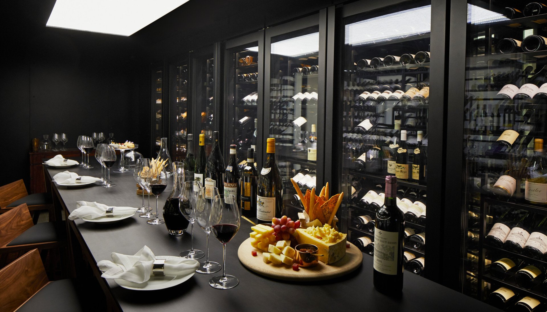 The Dorchester The Wine Vault,  red wine being poured and cheese and fruit