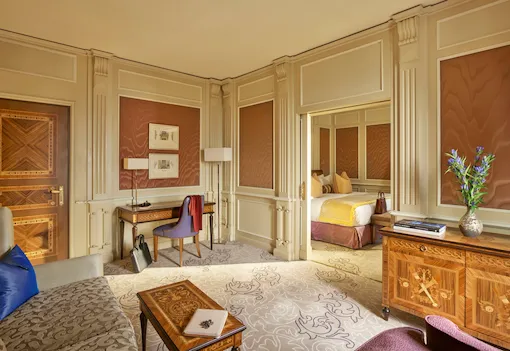 Ambassador Suite Living Room showing the study corner and a small glimpse of the bedroom