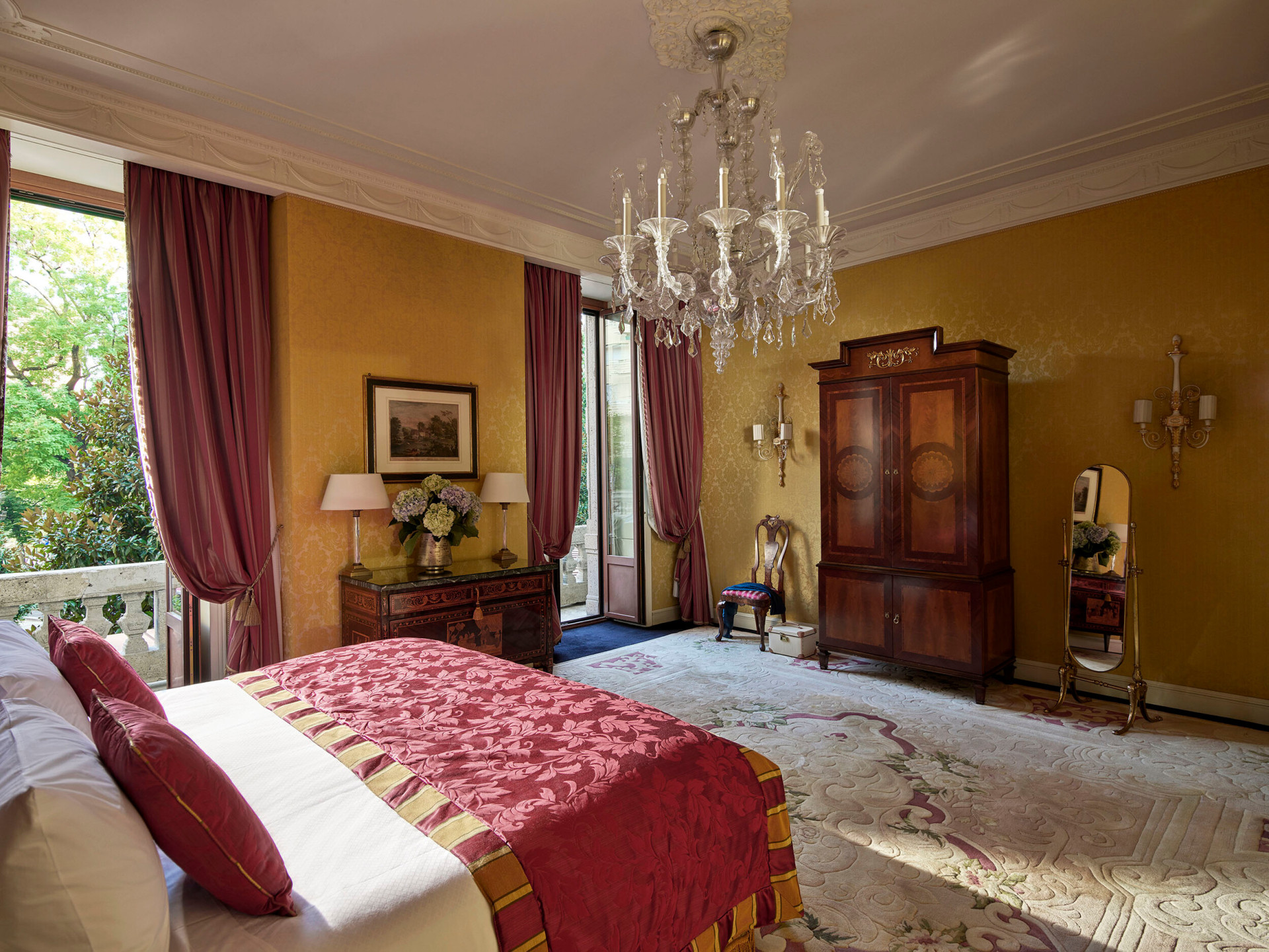 Royal Suite Bedroom revealing the majestic chandelier hanging from the ceiling