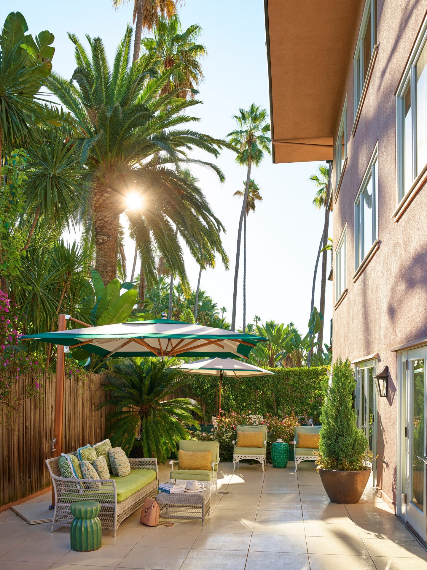 Paul Williams suite sunny patio with garden furniture at The Beverly Hills Hotel, Los Angeles
