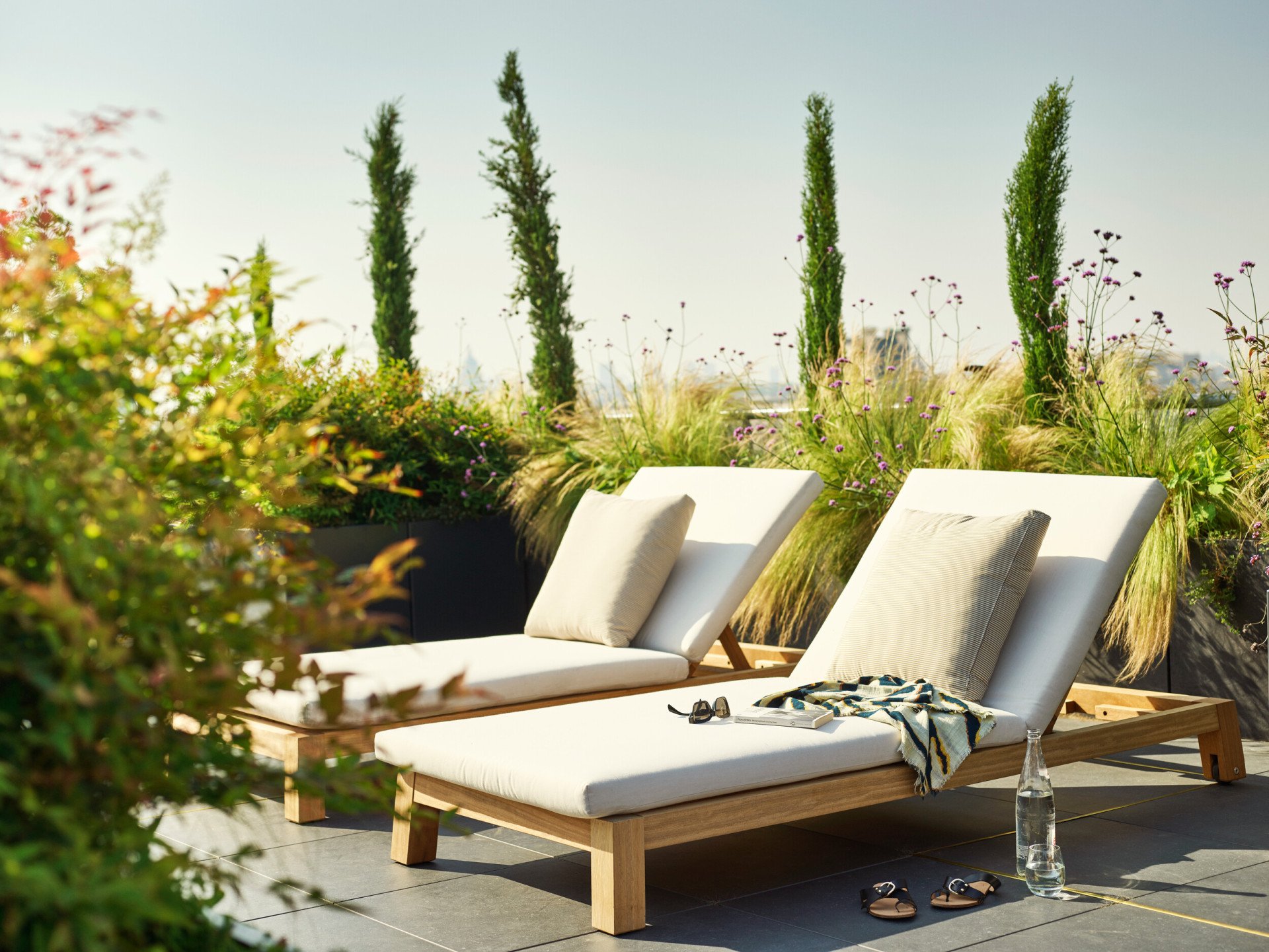 Sunbeds on the rooftop of the Belle Etoile suite at Le Meurice, Paris.