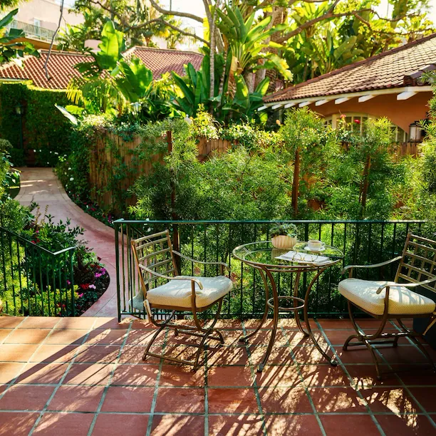 Bungalow Room Patio with glasses, script and coffee