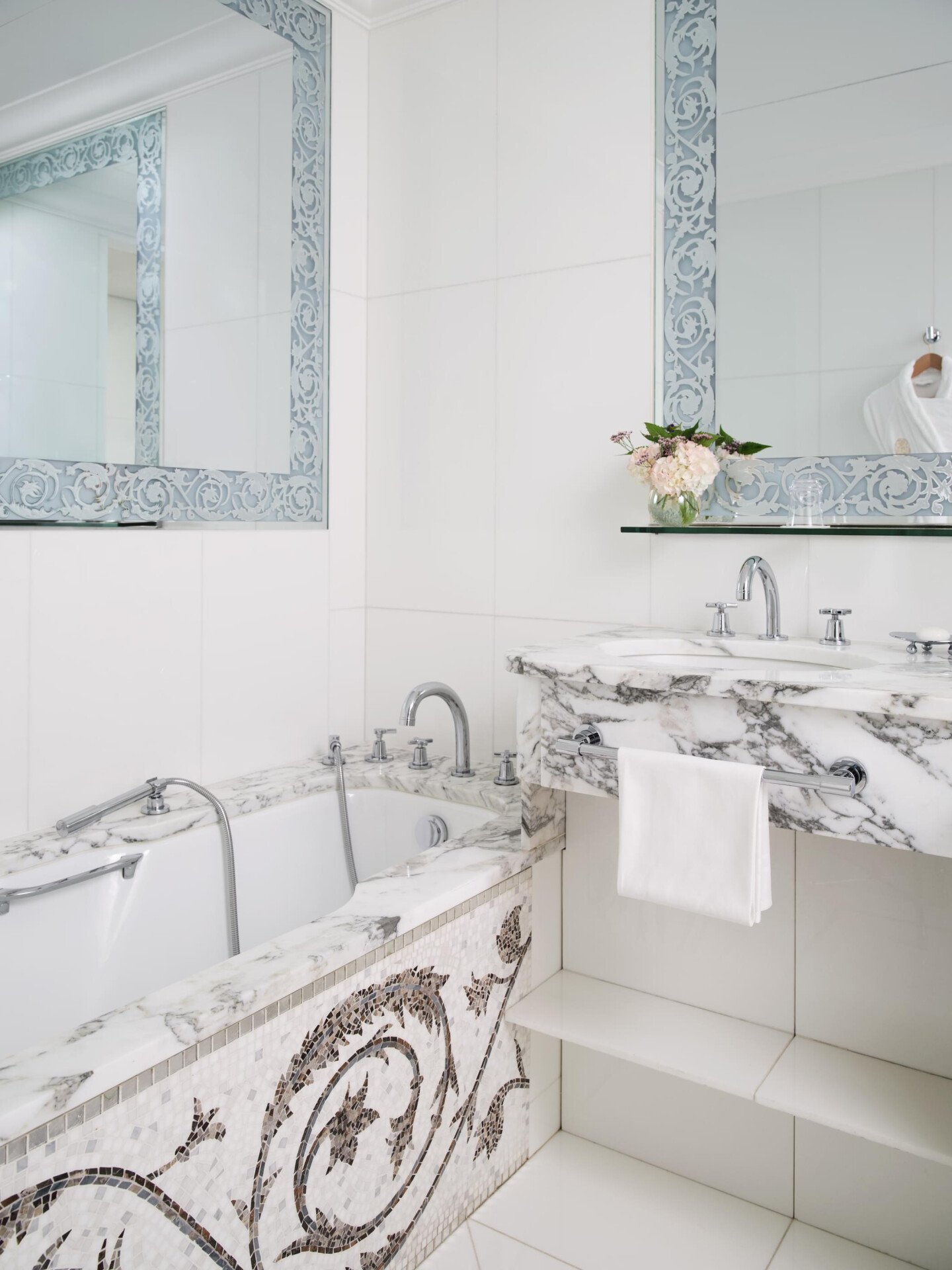This is the bathroom of the Deluxe Room Av. Montaigne View #206 at the Plaza Athénée. 