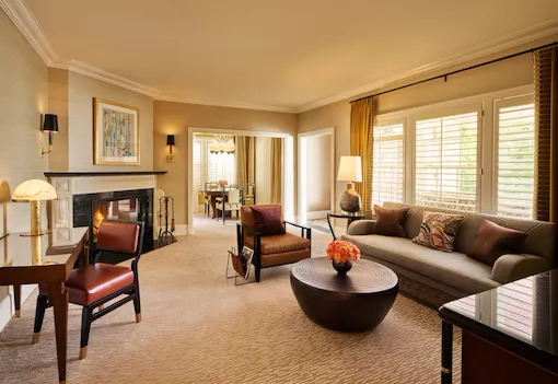 Crescent Bungalow Suite Living area with fireplace at The Beverly Hills Hotel, Los Angeles
