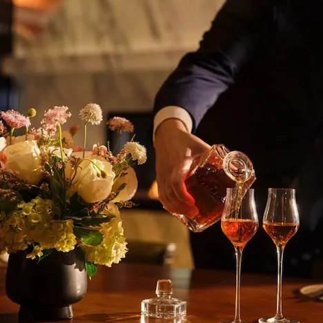 Whisky pour in the private dining room