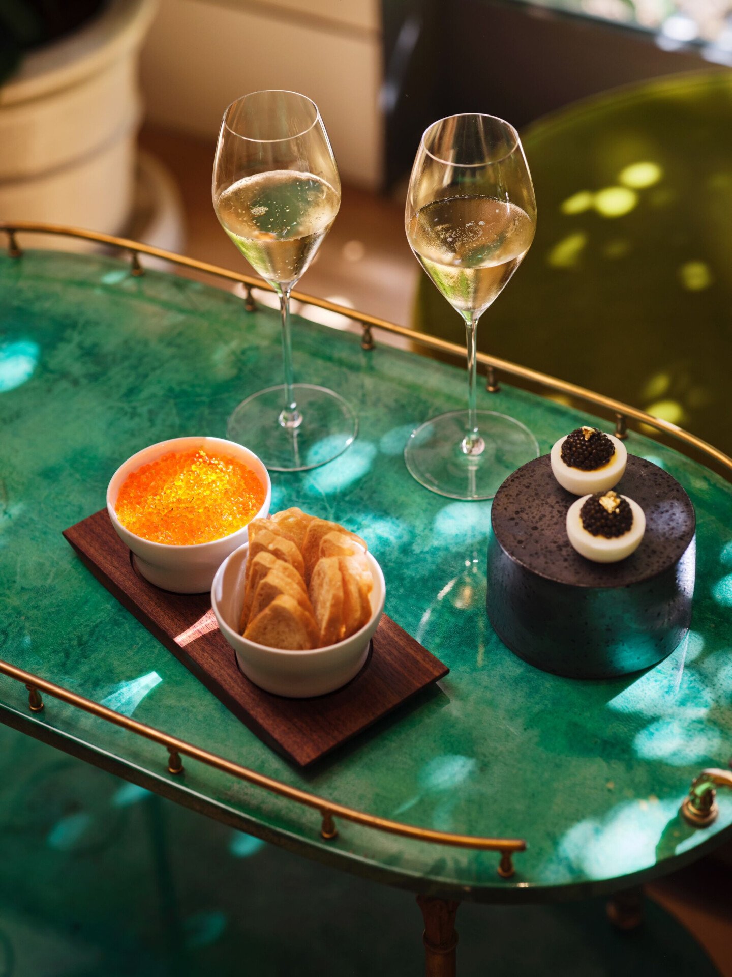 The chino devilled eggs with caviar and ora king and smoked salmon rillettes and baguette dishes in The Living Room