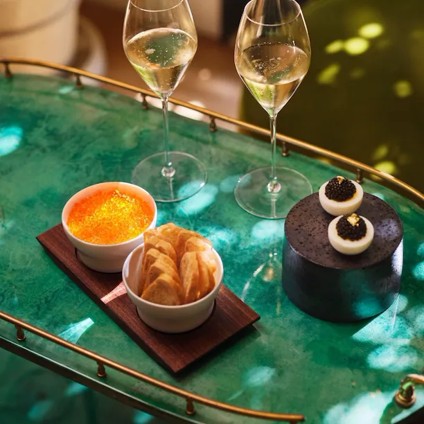 The chino devilled eggs with caviar and ora king and smoked salmon rillettes and baguette dishes in The Living Room