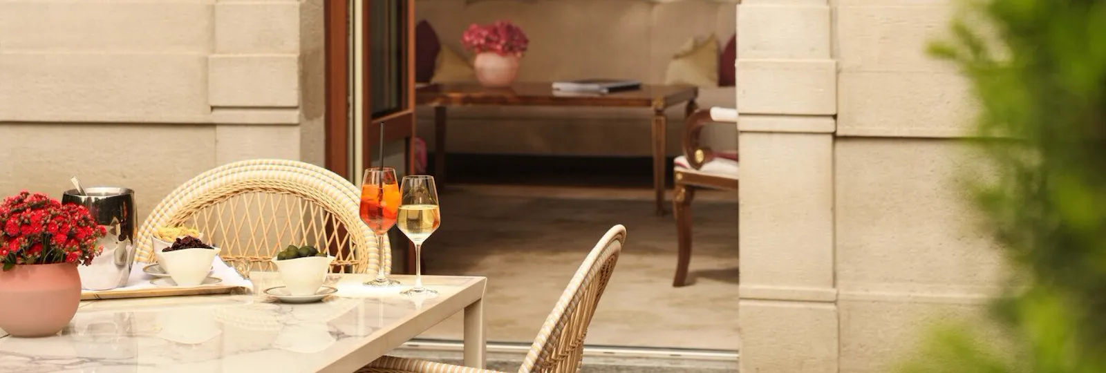 View of the Principe Suite showing aperitif details in the foreground and its design in the background