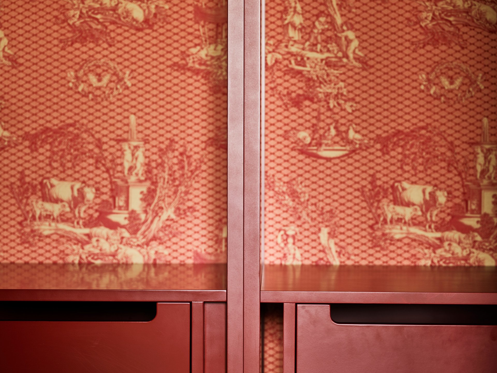 Detail of wardrobe with red drawers and wallpaper at Prestige Suite at Hotel Eden, Rome