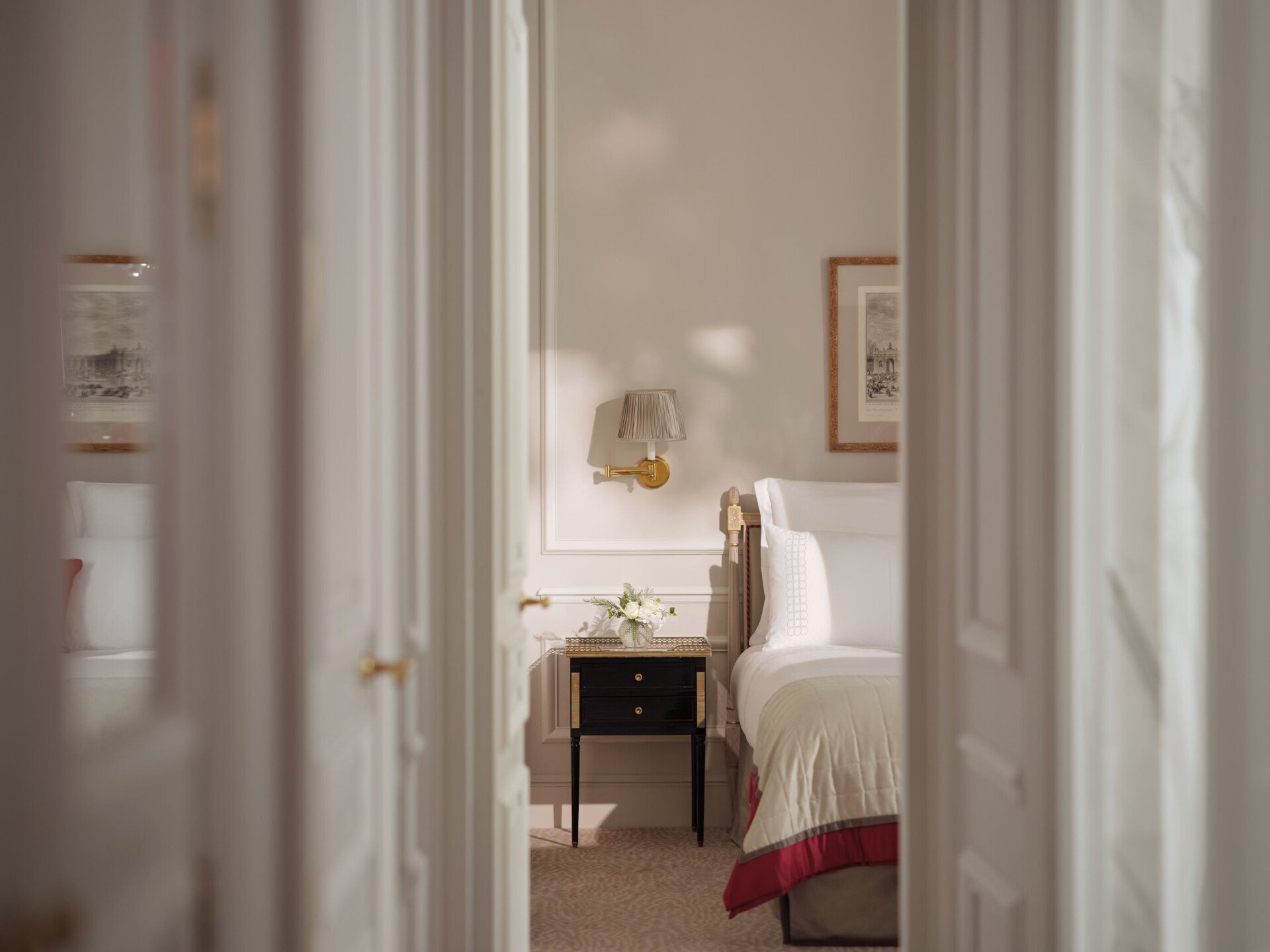 This is the bedroom of the Superior Suite #218 at the Plaza Athénée seen from the living room doors.