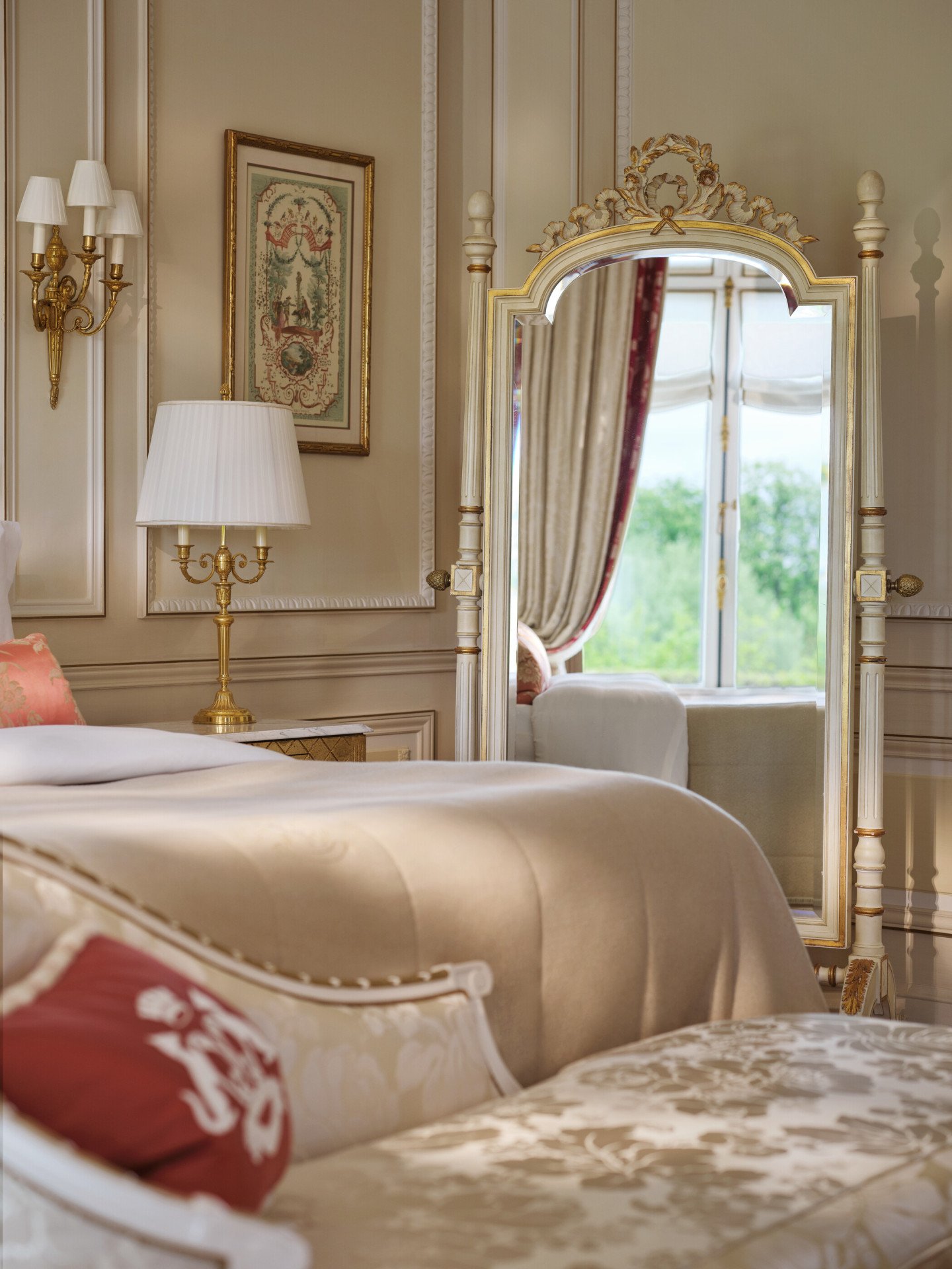 Reflect of the bed and the curtain in the mirror of a Versailles Suite, at Le Meurice, Paris