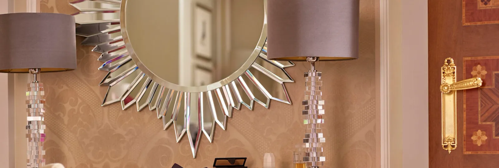 Principe Suite Detail showing a mirrored vanity table and a pair of lilac shoes on the floor
