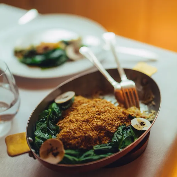 Picture of sea bream gratin with cutlery at Le Relais Plaza