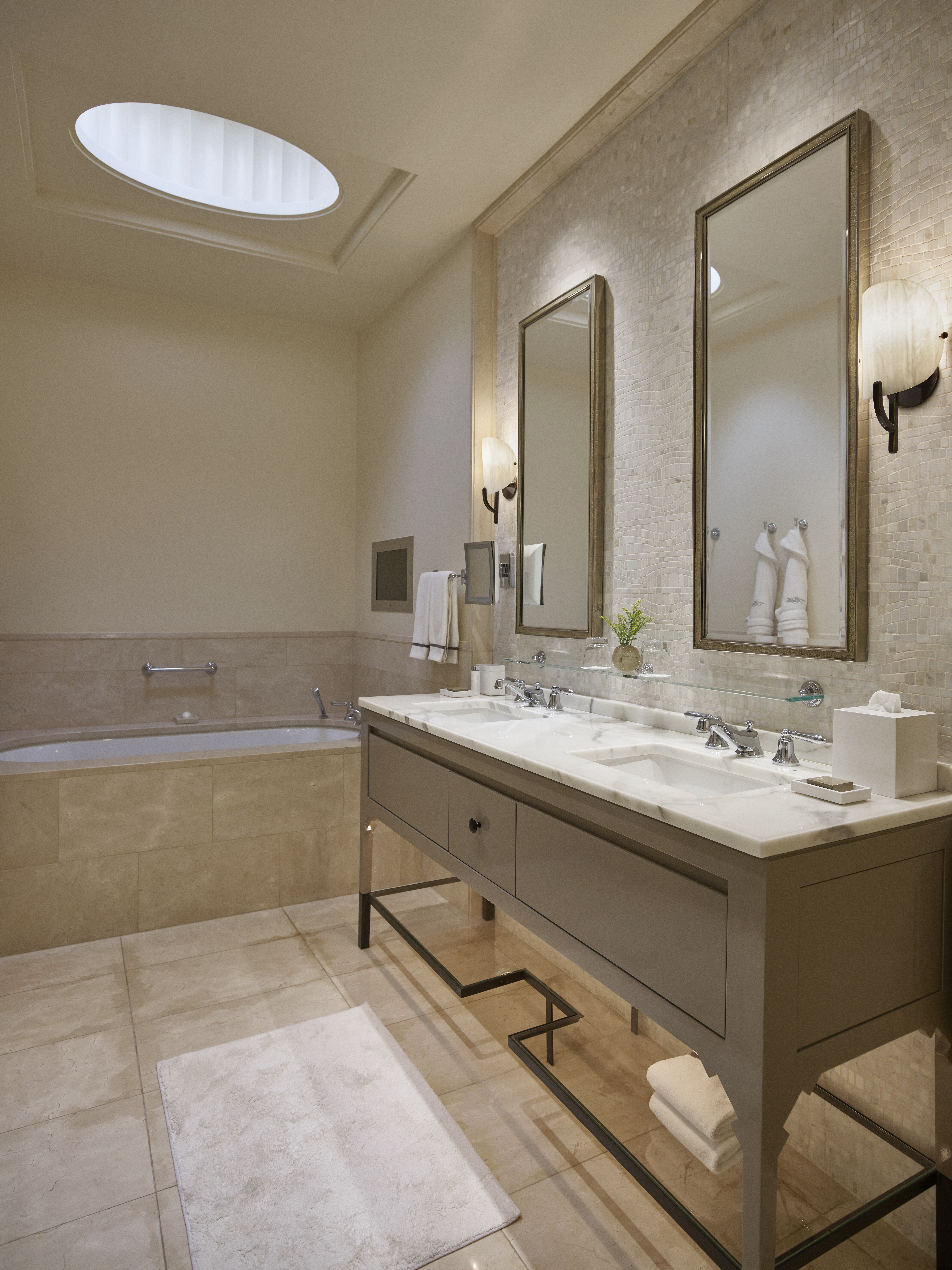 Vanity in marble bathroom of suite at Hotel Bel-Air 