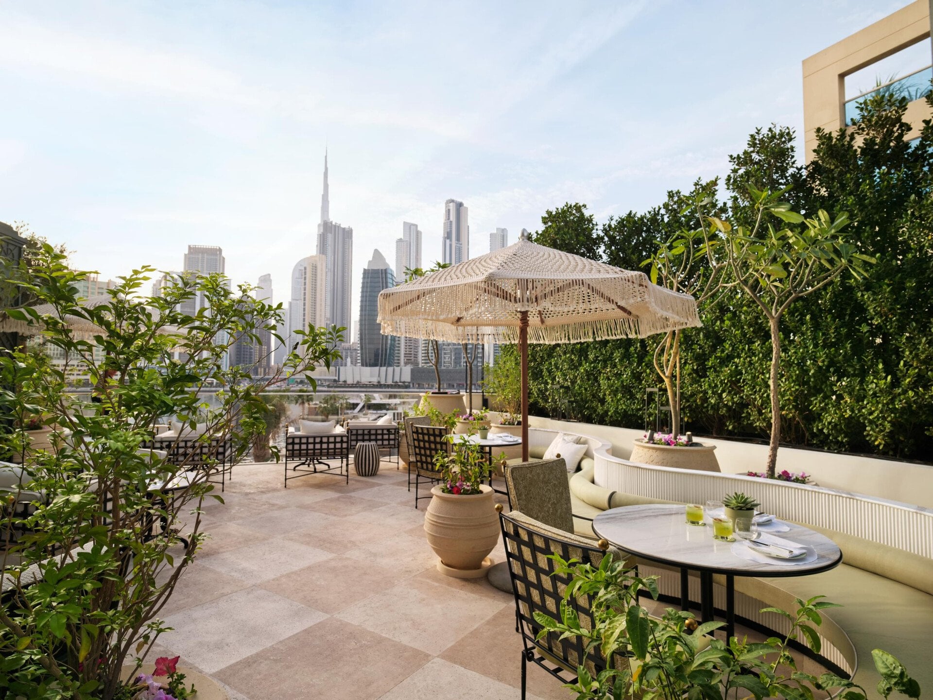 Image of Veranda design and food at The Lana - Dorchester Collection