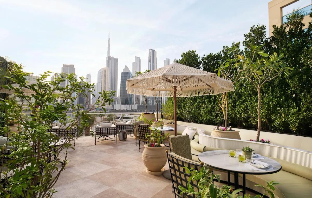 Image of Veranda design and food at The Lana - Dorchester Collection