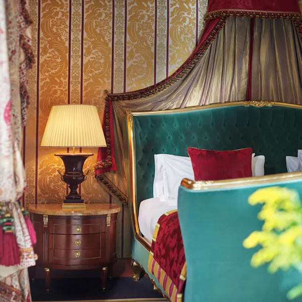 Presidential Suite master bedroom with a detail of the bed