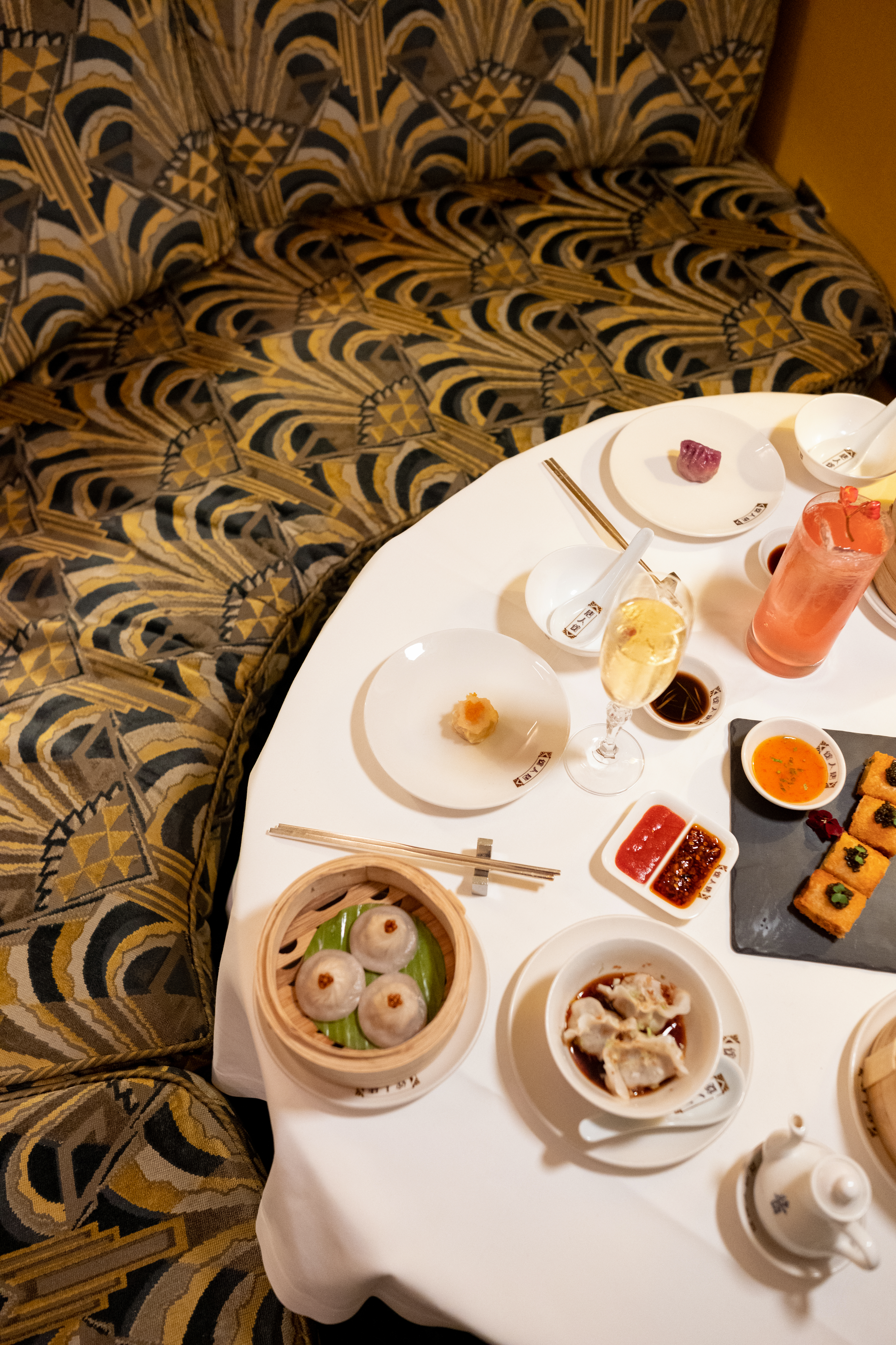 Birds eye view of table with dumplings and cantonese food at China Tang.  