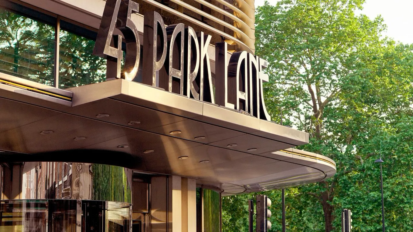 The exterior entrance of 45 Park Lane, London in daytime