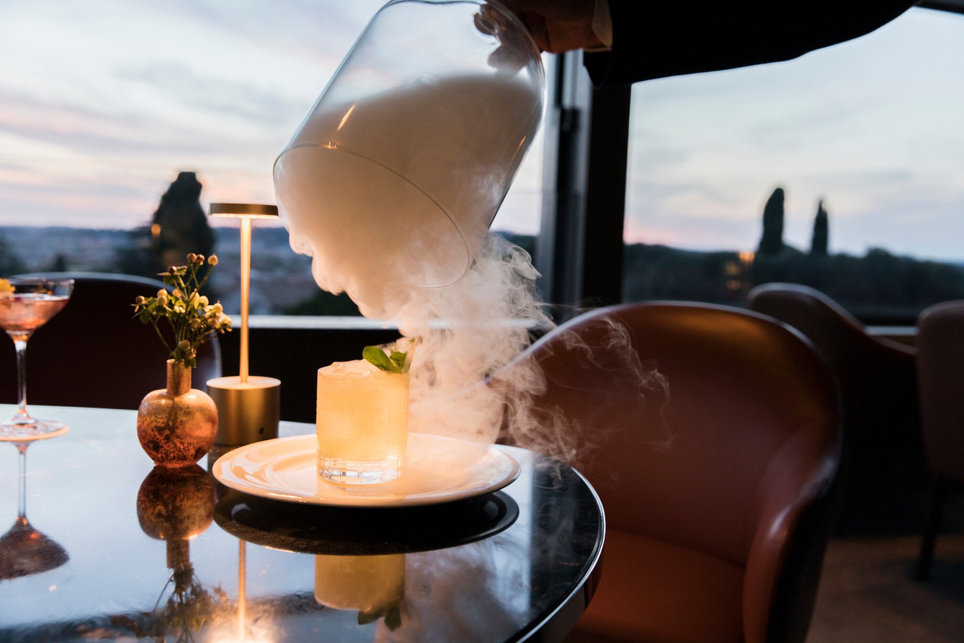 Cocktail with smoke at Il Giardino Bar at Hotel Eden, Rome