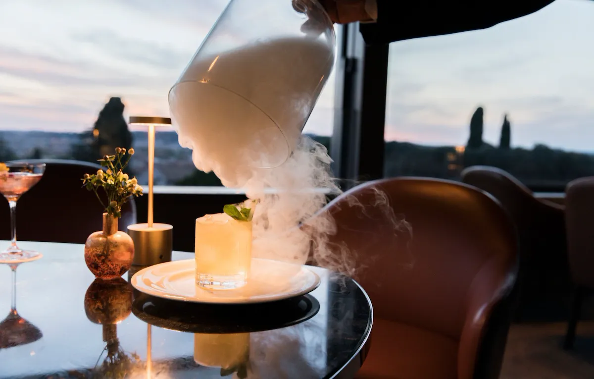 Cocktail with smoke at Il Giardino Bar at Hotel Eden, Rome