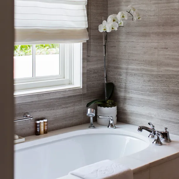 Marble bathrooms with double vanity and deep soaking tubs