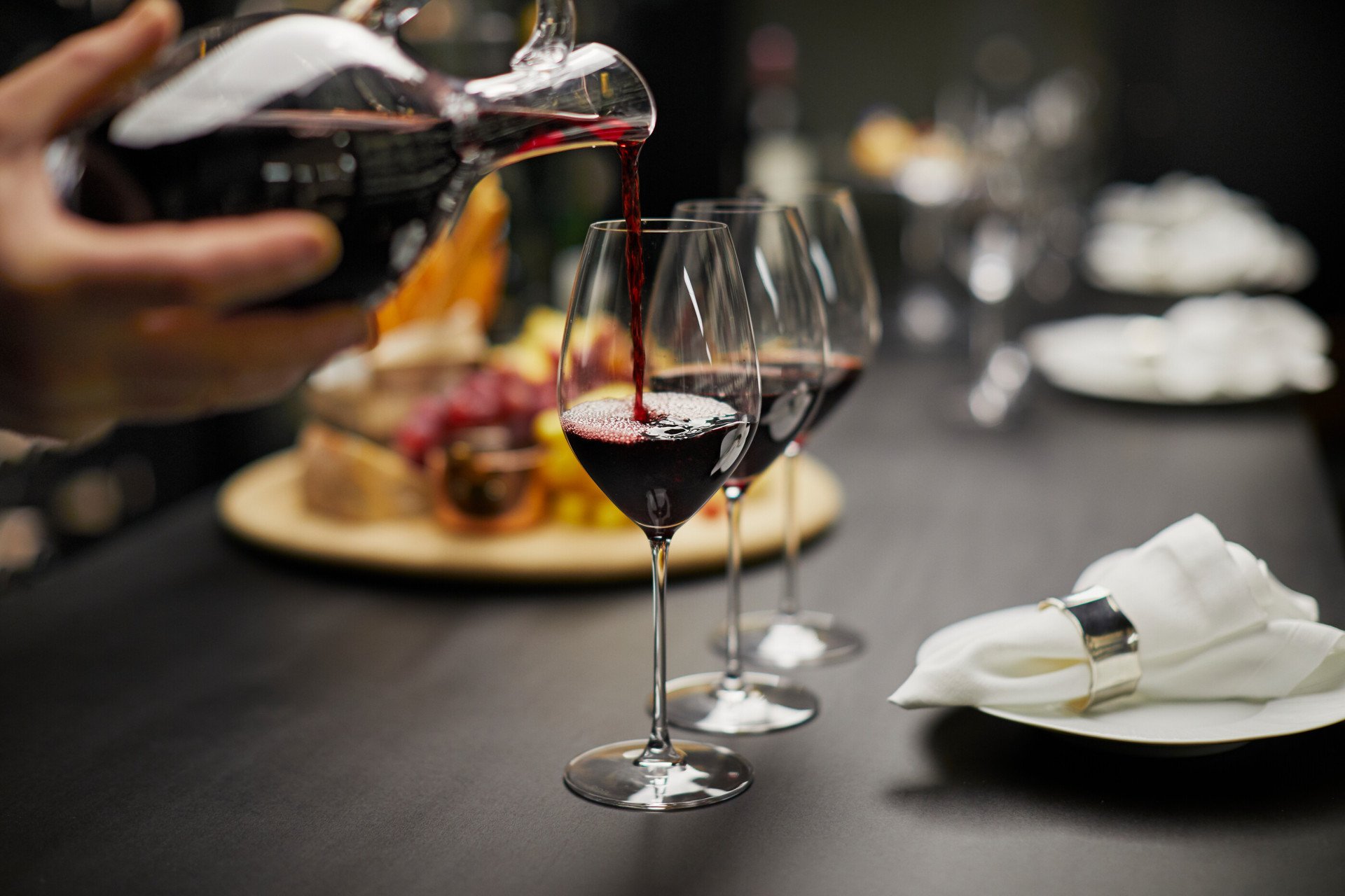 The Dorchester The Wine Vault,  red wine being poured 