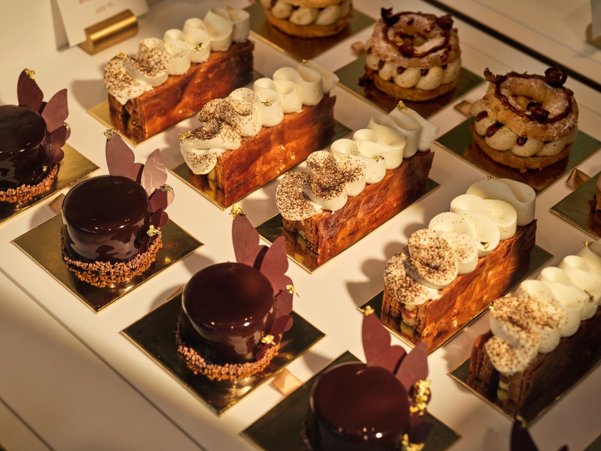 Pictures depict images of the different offerings offered at Bonbon Café as well as indoor and outdoor areas.