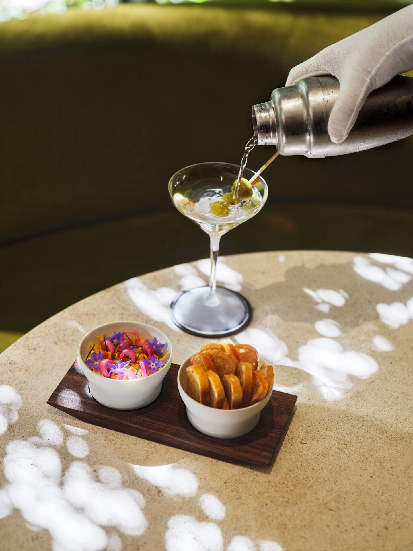 Vidalia onion dip and a martini pour in The Living Room