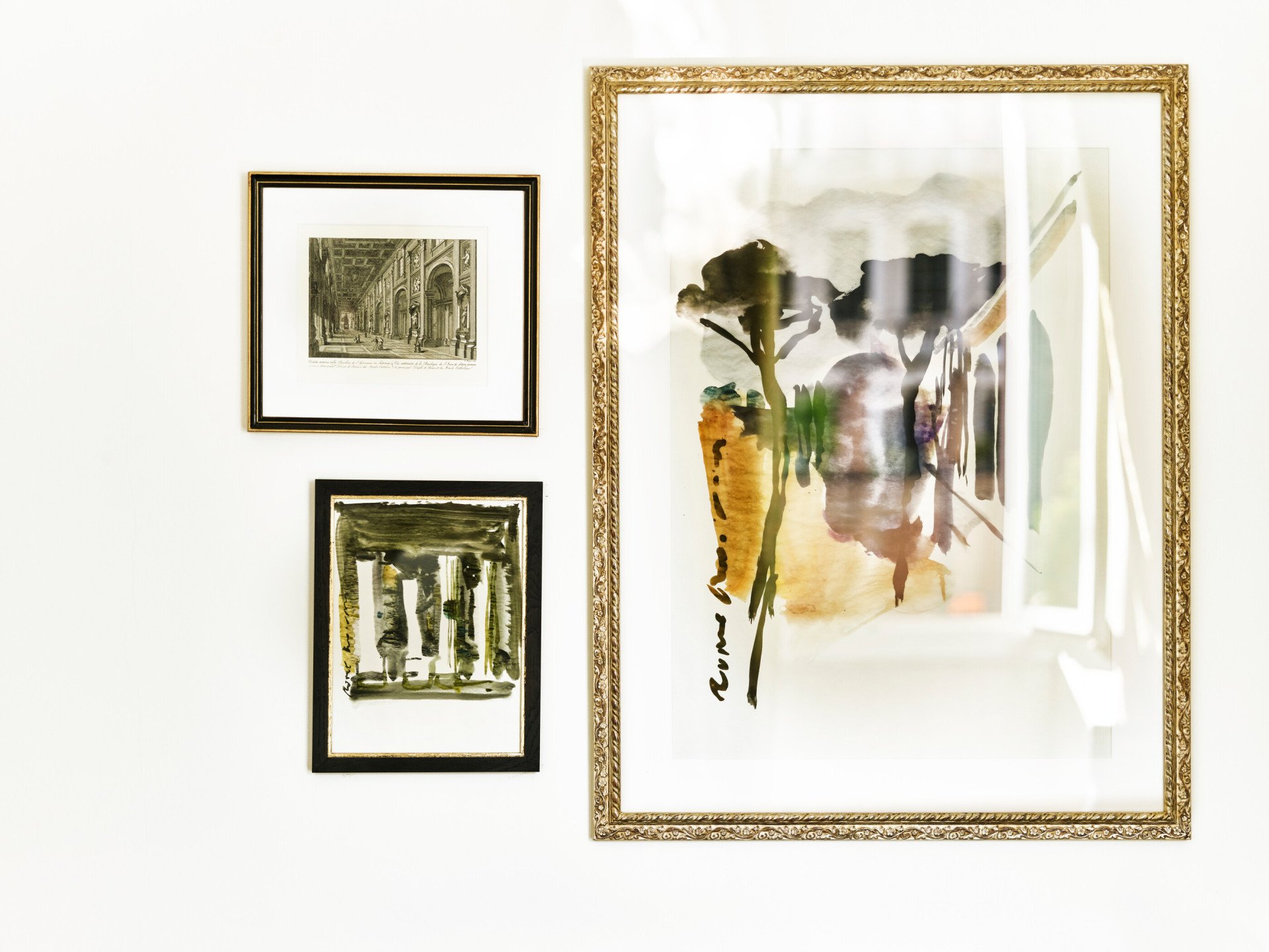 Three paintings and illustrations inside Junior Suite at Hotel Eden, Rome