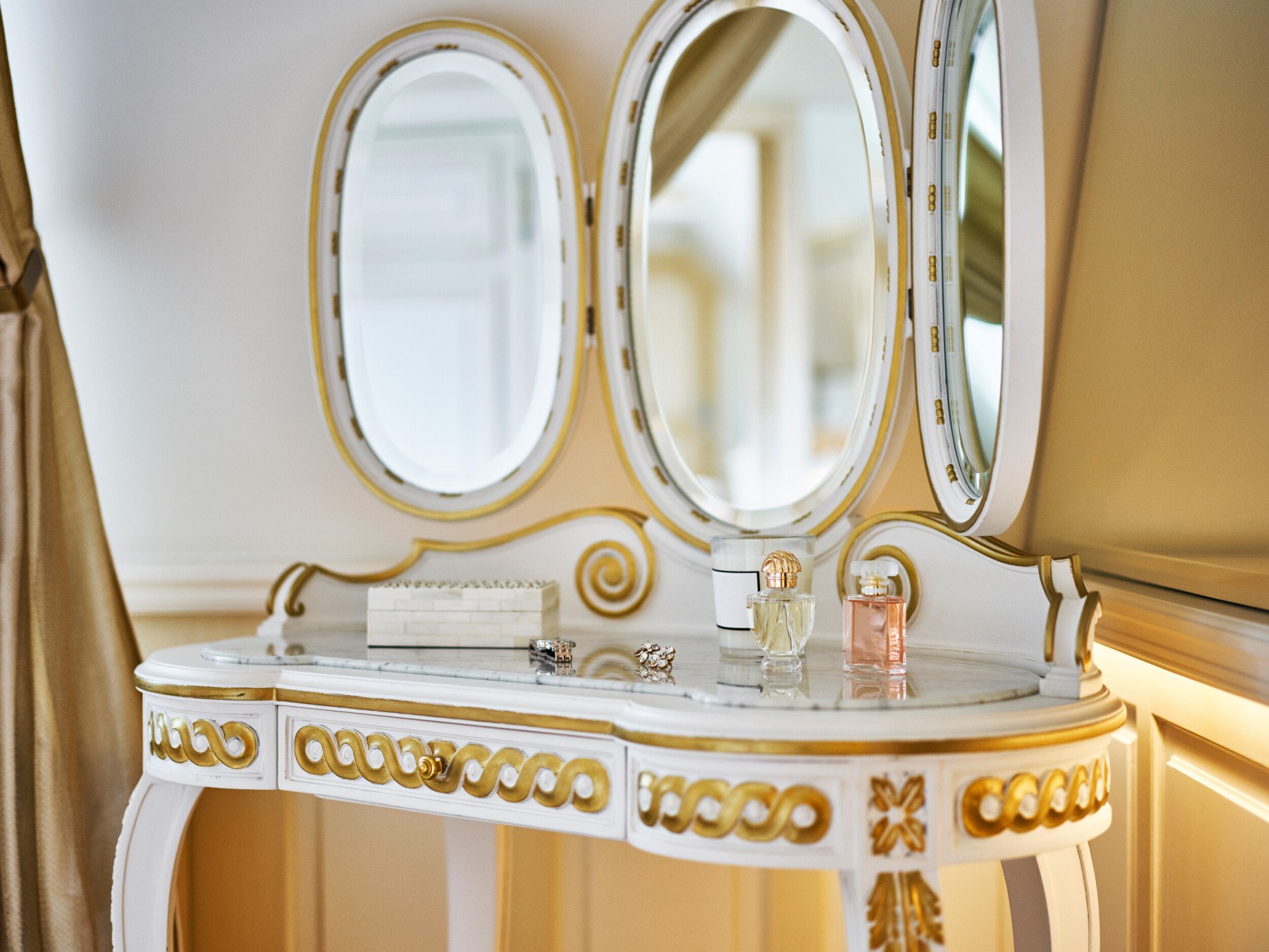 Perfumes on a dresser in the Parisienne suite, at Le Meurice, Paris.
