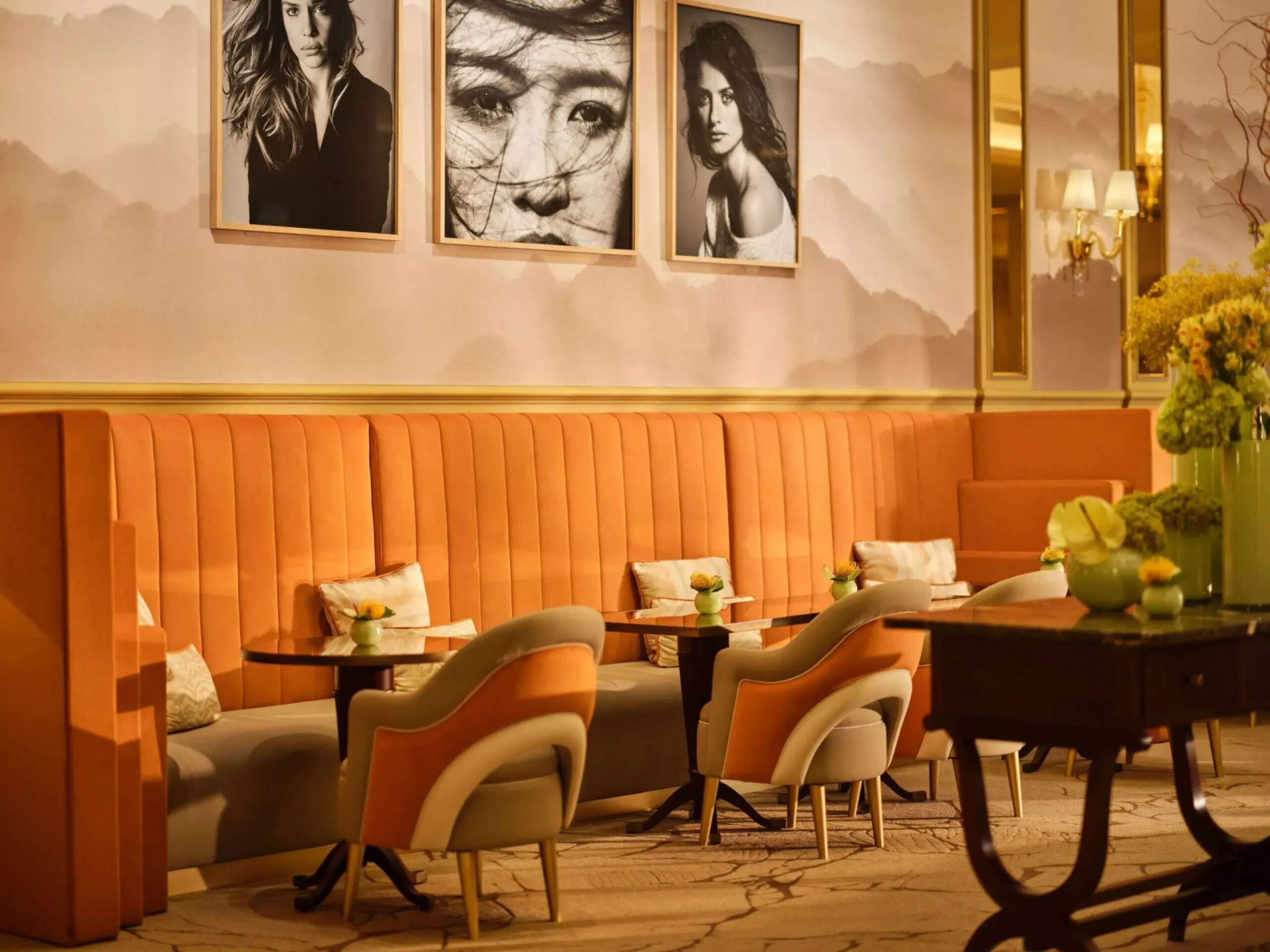 Il Salotto lobby lounge with black and white photographs hanging on the walls