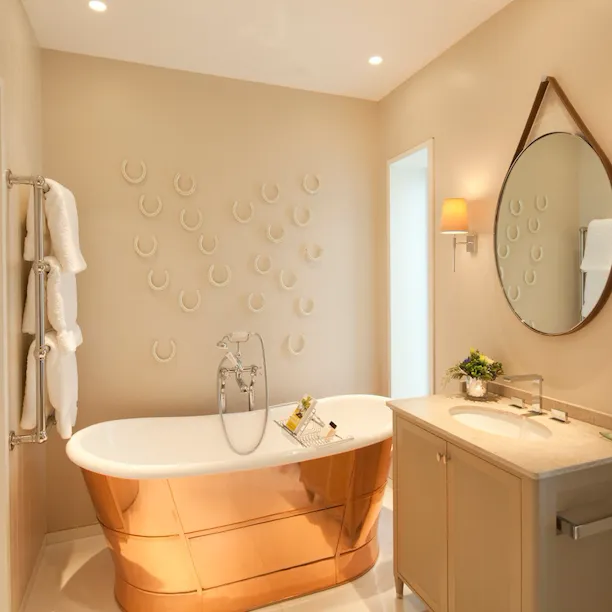 Stable Deluxe room bathroom interior at Coworth Park, Ascot