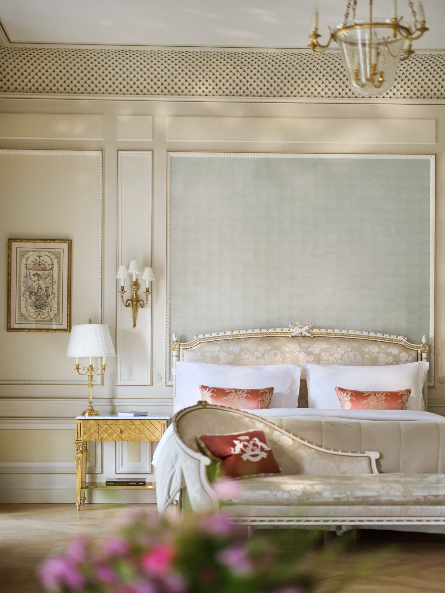 Front view of the bedroom of a Versailles Suite with the bed behind the couch, at Le Meurice, Paris