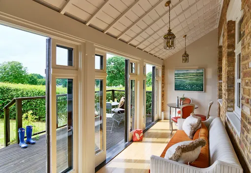 Coworth Park Gardener's East Cottage Suite Conservatory view interior