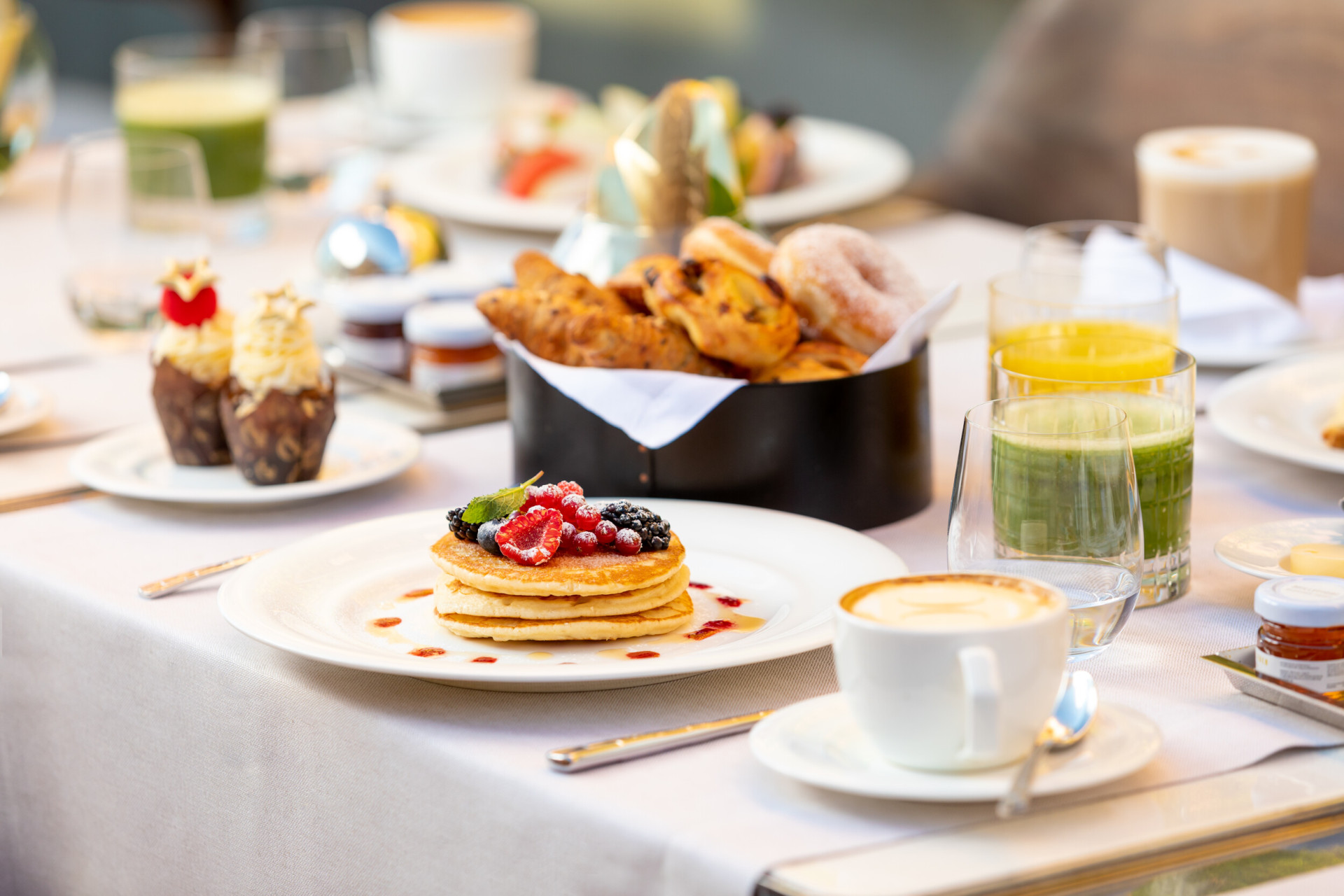 Breakfast with pancakes, cappuccino, cupcakes, selection of croissants and juices at Il Giardino Ristorante at Hotel Eden, Rome