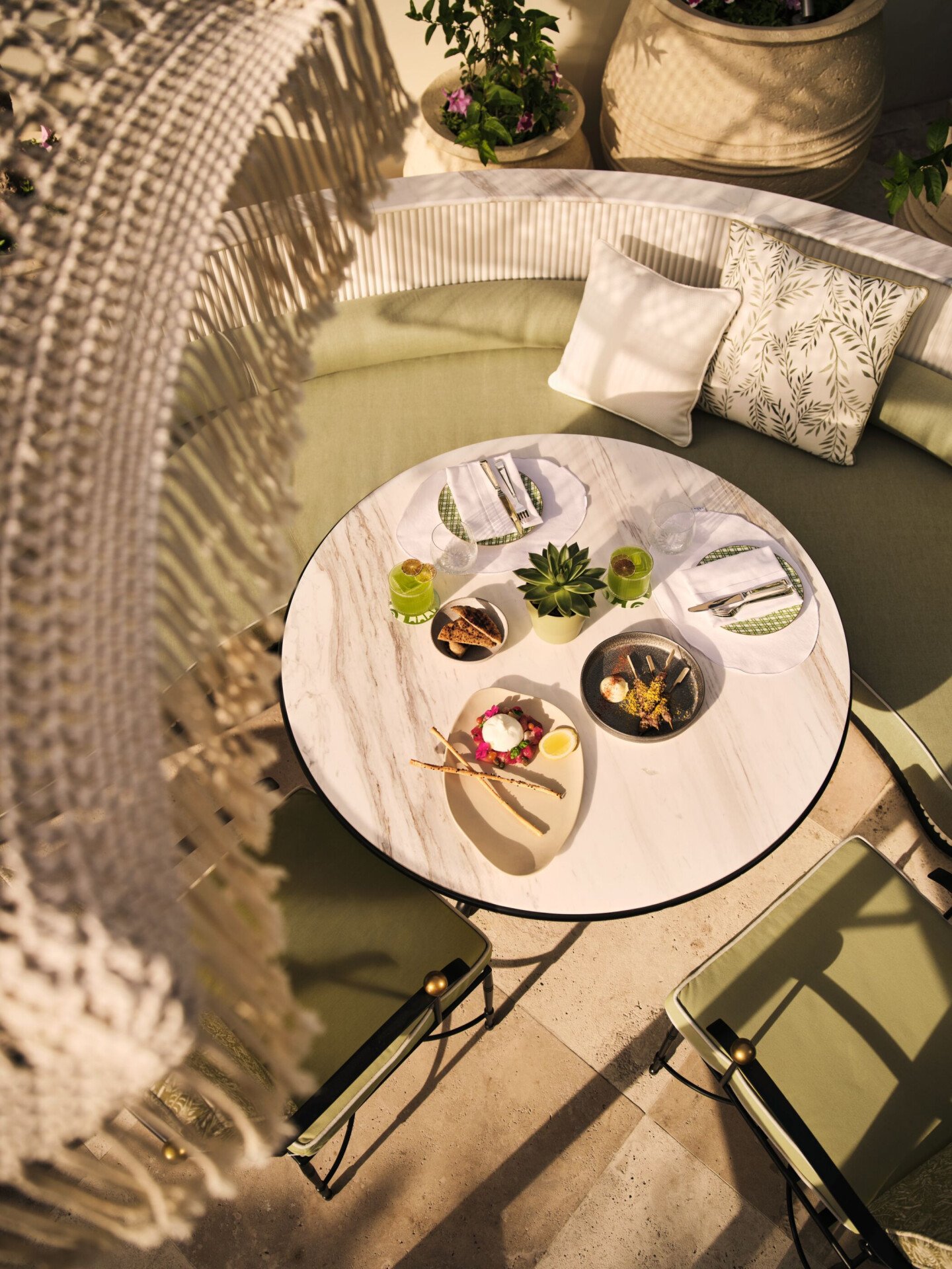 Image of Veranda design and food at The Lana - Dorchester Collection
