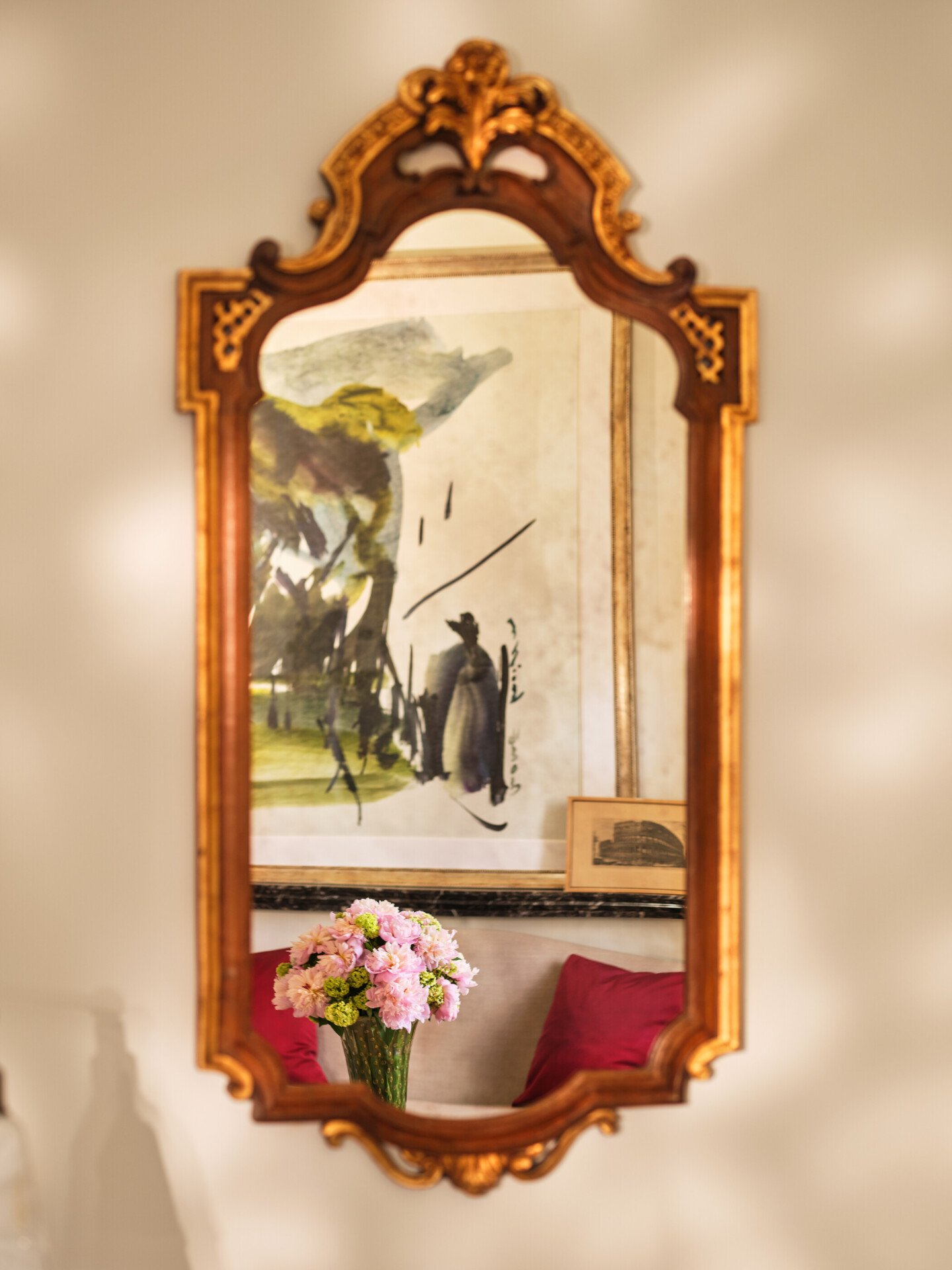 Mirror reflecting artwork at Eden Suite, Hotel Eden 