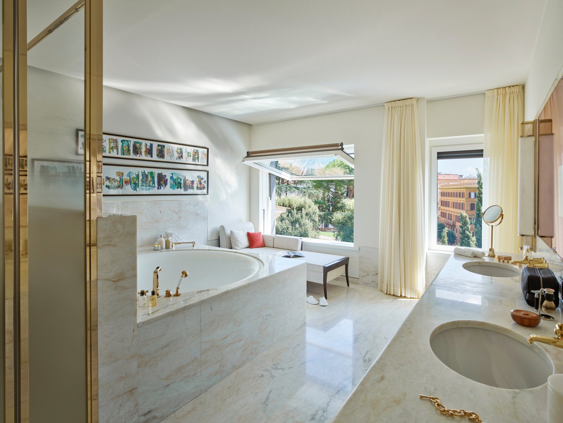 Bathroom with large bathtub inside Bellavista Penthouse Suite at Hotel Eden, Rome