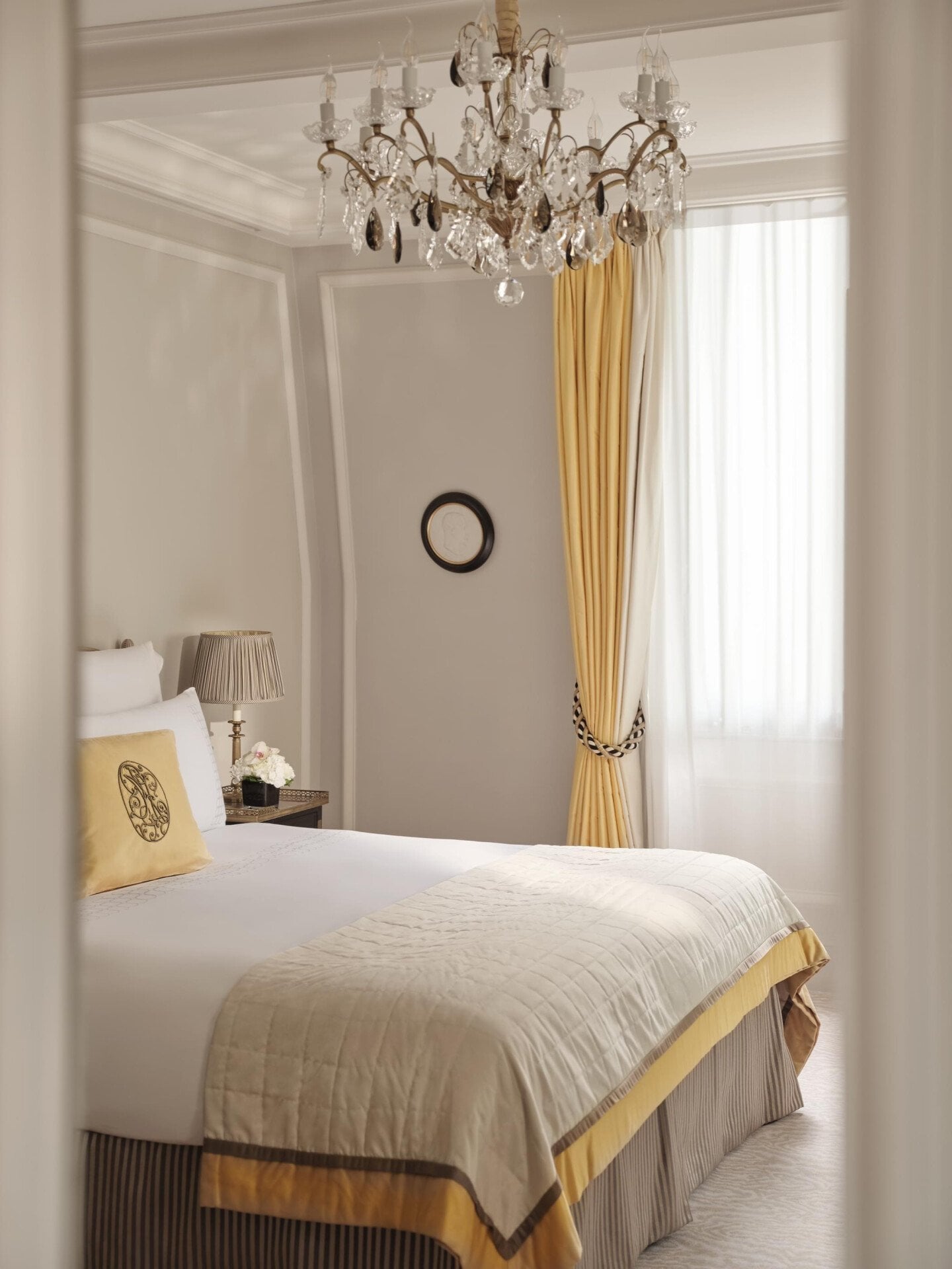 This is the bed of the Deluxe Suite #318 at the Plaza Athénée. 