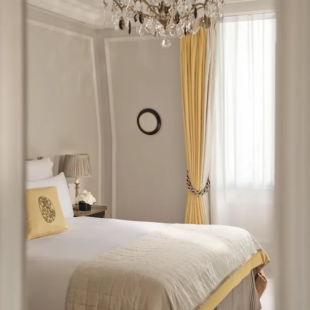 This is the bed of the Deluxe Suite #318 at the Plaza Athénée.