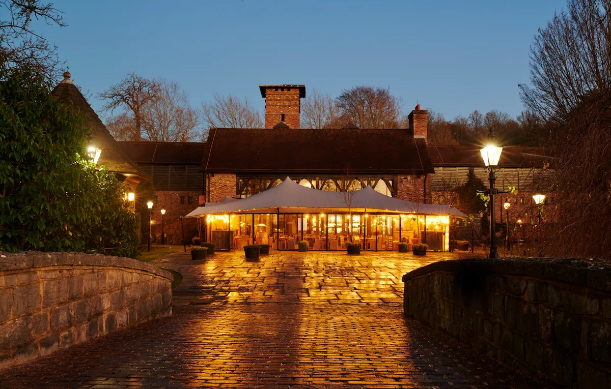 The Barn exterior lit up at evening