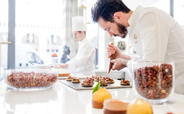 Cedric Grolet at work at boutique at Le Meurice, Paris