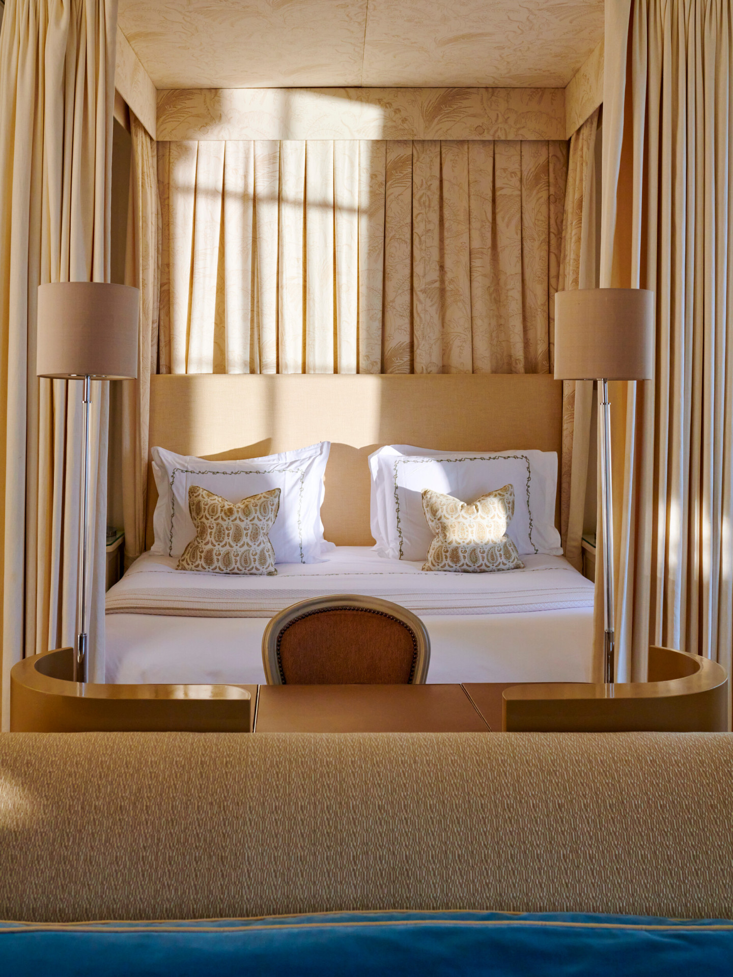 Mansion House Junior Suite bedroom bathed in sunlight at Coworth Park