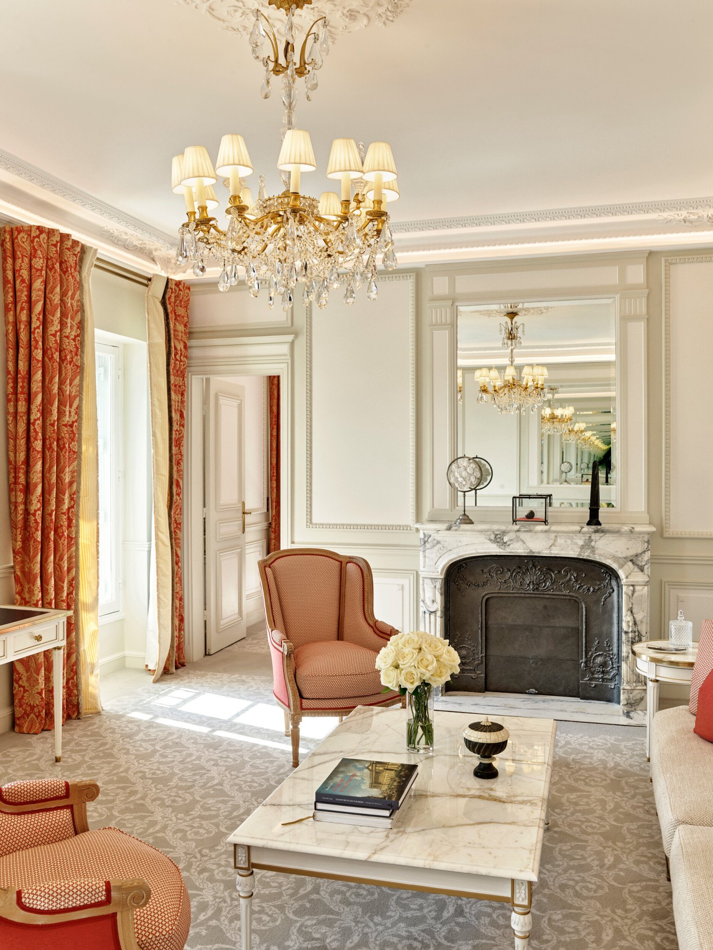 Portrait shot of the living room in an executive suite at Le Meurice, Paris.