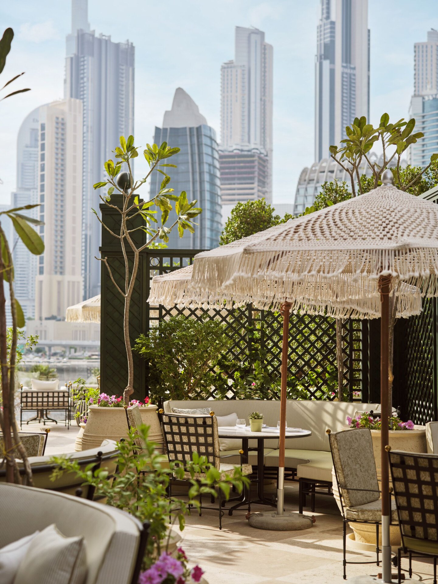 Image of Veranda design and food at The Lana - Dorchester Collection