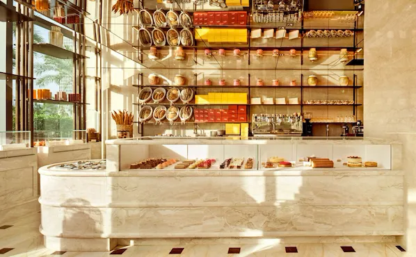 Pictures depict Bonbon Café Angelo Musa indoor and outdoor areas.