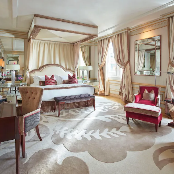 Imperial Executive Suite Bedroom enhanced with warm colours pieces of furniture